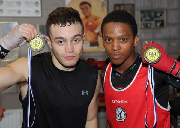 Dean Duff and Mosa Kambule from Lisburn ABC both won titles during the County Antrim intermediate championships held at the Dockers' Club, Belfast. US1541-543cd  Picture: Cliff Donaldson