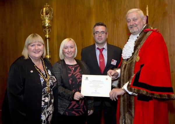 Aisling and Barry Creaney accept a posthumous award on behalf of their late son Oran from the Lord Mayor of Newscastle Tyne and Wear,. Also pictured is the Lady Mayoress