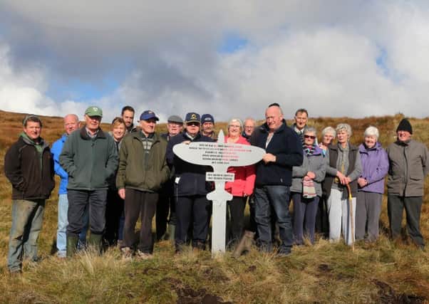 Members of Glenravel Historical Society who unveiled a plaque to mark the 75th anniversary of the air crash which claimed the lives of five airmenon Slievenane mountain above Cargan. INBT 43-120JC