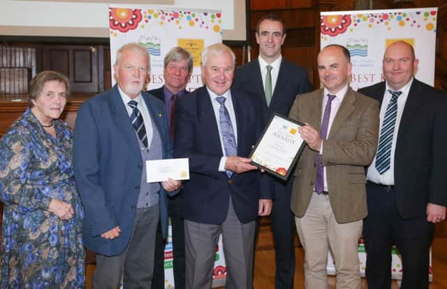 Pictured at the awards ceremony are (from left) Doreen Muskett MBE, David Brown, Brighter Whitehead, Joe Mahon, Bill Pollock, Brighter Whitehead, Environment Minister Mark H Durkan, Stehpen Daye, Mid and East Antrim Council and Ian Campbell, Open+Direct Insurance Glengormley branch. INCT 43-702-CON