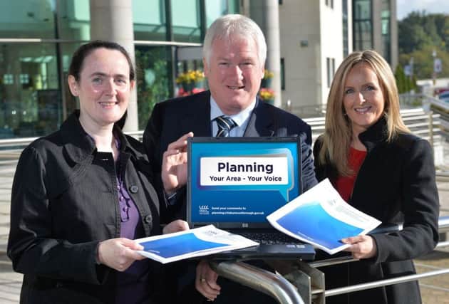 Chairman of the Planning Committee, Alderman Michael Henderson at the launch of the draft Statement of Community Involvement along with Planning Managers Rosaleen Heaney and Lois Jackson.