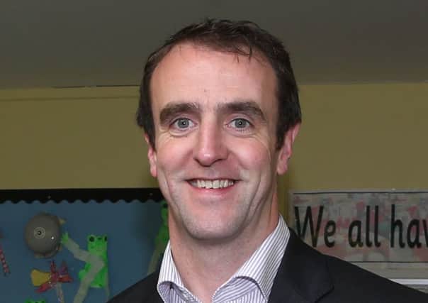 Minister for the Environment Mark H Durkan.
