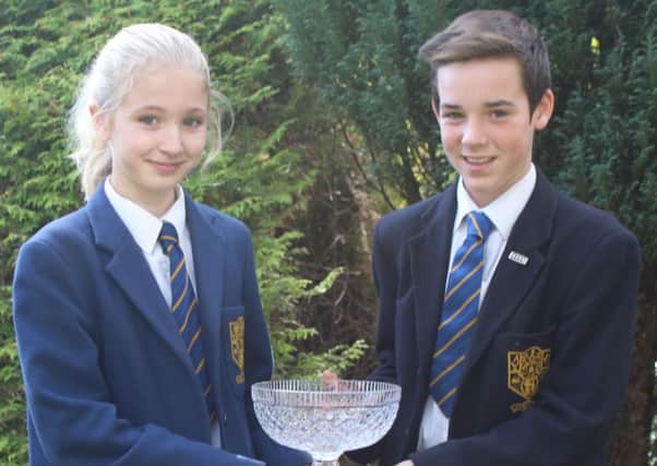 Kirsten Child and Josh Cruickshank collected the Donaghadee Bowl on behalf of Form 8P. INNT 44-821CON