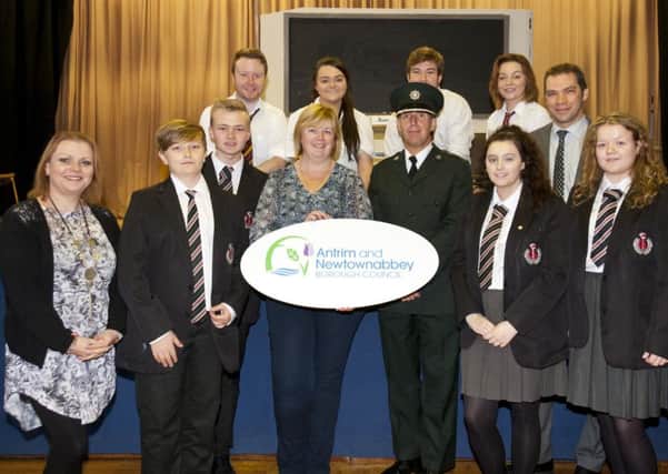 Fionnuala McGoldrick (writer); Stephen Beck and Cameron Hughes; Cllr Linda Clarke, Chair of Antrim and Newtownabbey PCSP; Superintendent Muir Clark, PSNI District Commander for Antrim and Newtownabbey; Sophie Curran; Mr Millar, Lucy Walsh. Back row features cast members Conor Begley, Lauren McCrory, Bradley Curran and Sarah Jane Nugent. INNT 43-819CON