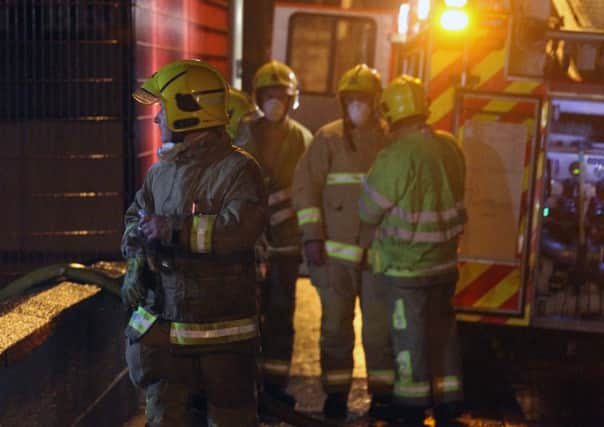 McAuley Multimedia 24th October 2015...Over 50 firefighters from the North coast prevented a fire spreading to neighbouring oil depot in Coleraine last night.The fire service attended the scene of the fire in a commercial building at Hillman's Fancy, Coleraine, at 2231 Hrs on Friday night.
They prevented a fire that caused 'extensive' damage to a commerical building from spreading to a neighbouring oil depot

It was close to Coleraine Football Club grounds and adjacent to the main Coleraine to Derry railway line.

The first appliances at the scene requested extra resources to attend and at the height of the blaze eight fire engines and a specialist Command Support unit were in attendance with over 50 personnel.

The main building measuring approximately 50x20 meters comprised three units, a car repair workshop, an engineering works and a car wash area.

A spokesman explained: "One of the units has been extensively damaged however firefighters worked hard to contain the blaze and prevent a neighbouring oil dep