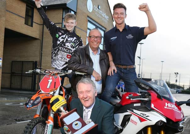 PACEMAKER, BELFAST, 22/10/2015: Northern Ireland's newest motorcycling champions Josh Elliott, 2015 British Superstock winner and Ulster and Irish Motocross title holder, Curtis Trimble launch the Cornmarket Motorcycle Awards which will be held in Belfast on January 29, 2016. Joining the new champions are David Weir of the Enkalon Motorcycle Club and Sam Geddis, Managing Director of Cornmarket Insurance Services with the Joey Dunlop trophy that will be presented to the Irish Motorcyclist of the Year on the night.
PICTURE BY STEPHEN DAVISON