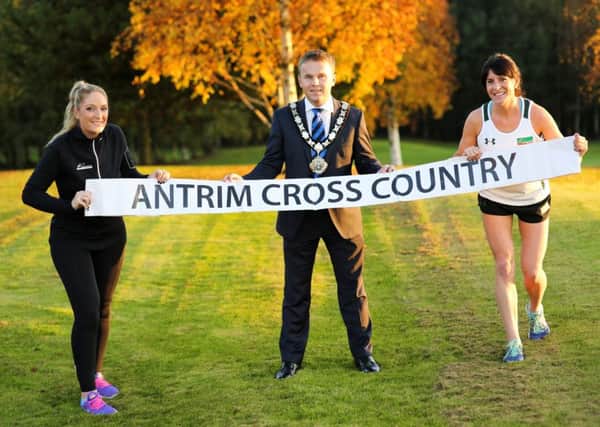 North Belfast athlete, Breege Connelly, Stef Foster, Marketing, Communications & Events Manager of Athletics NI and Mayor of Antrim and Newtownabbey, Cllr Thomas Hogg at the launch of the IAAF Antrim International cross-country event.