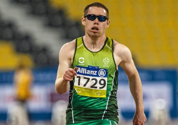 Ireland's Jason Smyth, on his way to winning the Men's 100m T13 Final in a time of 10.62. IPC Athletics World Championships. Doha, Qatar. Picture by Marcus Hartmann/SPORTSFILE