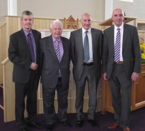 Rev. Geoffrey Allen with former minister Rev. Robert Hanna and Elders Mr. Harold Kerr and Mr. Gordon Bond.