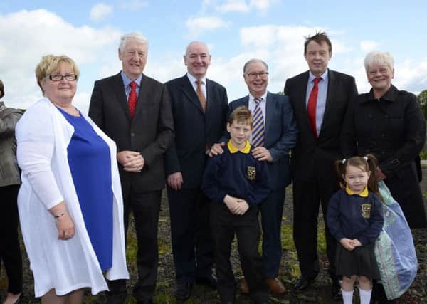 Pictured at the cutting of the first sod on the site of the new Foyle College and Ebrington Primary School buildings at Caw: Mildred Garfield, Governor, John Manning, BoG chairman Ebrington PS, Mark Durkan MP, Luke Pentland, pupil, Nigel Dougherty, Principal Ebrington PS, Barry Mulholland, Regional Managing Director, Education Authority, Jessica Smallwoods, the youngest P1 pupil, and Irene Stone, Vice-Principal. INLS2215-111KM