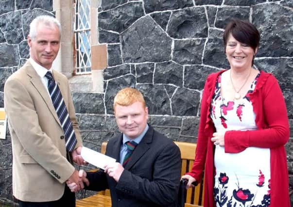 Eddie & Margaret McCormick presents Andy Allen a cheque for £1000 for the  Veterans Support Charty
INCR 38 414 MP
