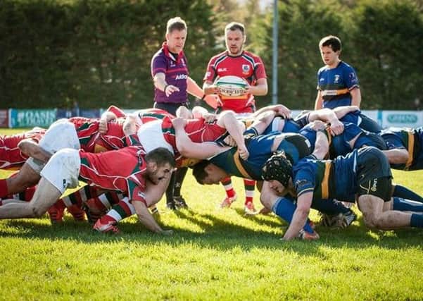 Action from Saturday's Larne v Lisburn match.  INLT 44-690-CON