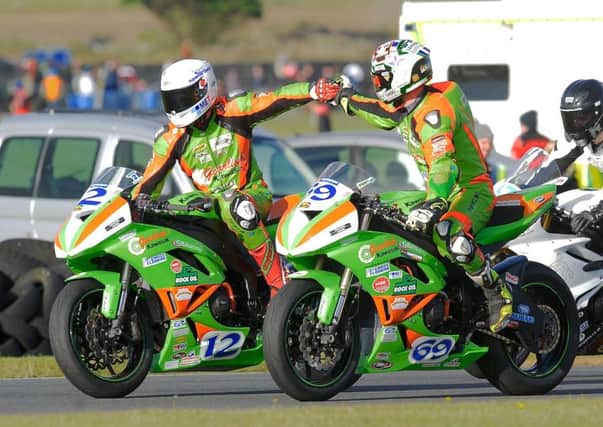 'Man of the meeting' Glenn Irwin congratulates his brother Andrew after the second supersport race.  INLT 44-685-CON