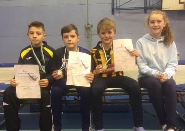 PJ (Patrick) Grant, Rowan Hynds, Conor Napier and Eve Ryden with their certificates.
