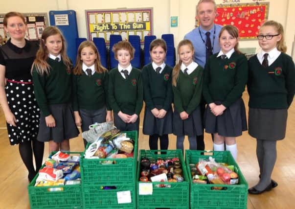 Children of Brownlee PS at the Foodbank.