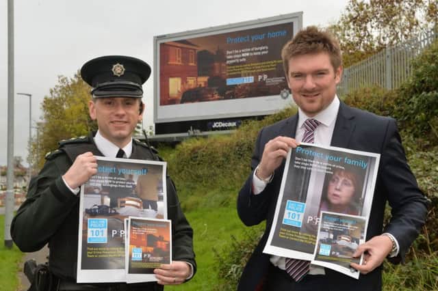 Councillor Scott Carson, Lisburn & Castlereagh PCSP Chairman is pictured with Chief Inspector John Wilson launching the local burglary awareness campaign. INUSdomesticburglarycampaign
