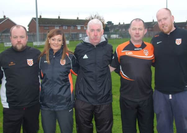 Members of the Clann Eireann management team Declan McCorry, Gary Lavery, Kieran Robinson, Sean McSherry with Andrea Nash.
