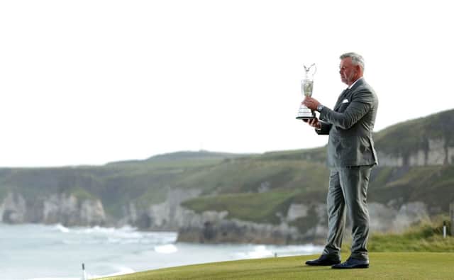 Darren Clarke with the Claret jug on the 5th green at the official announcement that The Open Championship is to be held in Royal Portrush in 2019, and twice more before 2040. Picture by Kelvin Boyes / Press Eye.
