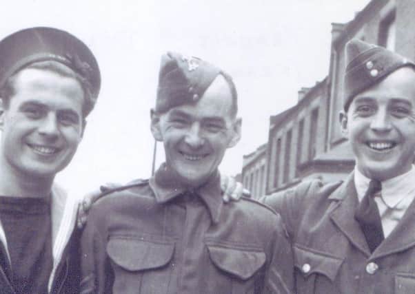Michael 'Mack' McCauley (left) and Denis McCauley (right) with their father Francis McCauley, Home Guard, centre.