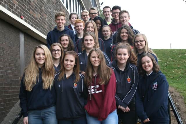 The Sixth Year Interact committee who funded the hockey coaching event and mentored the visiting pupils.