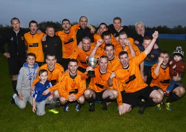 The Lisahally players celebrate after lifting the City Cup after defeating BBOB in last season's final.