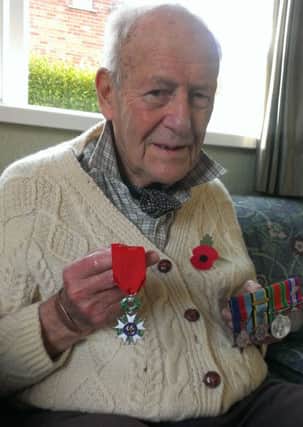 Frank Ferguson with his new Legion d'Honneur medal (left). INLT-45-703-VL