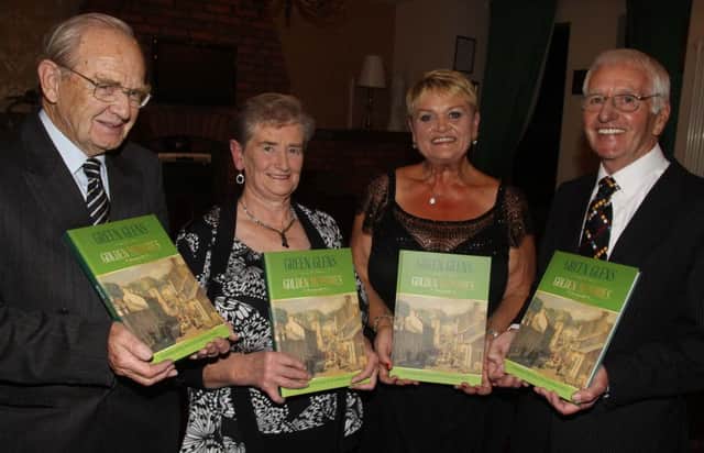 Eamon  Duffy Eileen McAuley Bernie Delargy and Frank Rodgers with the special Anniversary book pictured at the Glens of Antrim Historical society 50th Anniversary dinner and book launch at the Glens of Antrim Hotel Cushendall on Friday night
