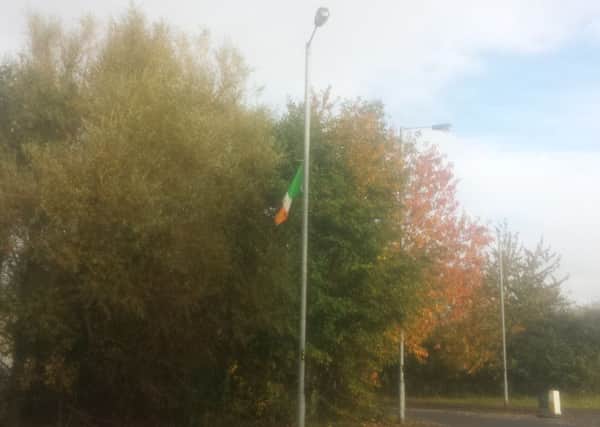 One of the flags erected close to the Felden shared housing development. INNT 45-814CON