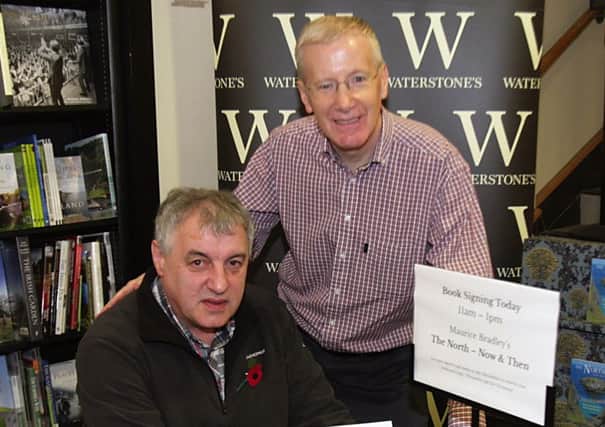 East Londonderry MP Gregory Campbell pictured at the book signing in Watrerstone's, Coleraine with Maurice Bradley. wkl4505mb
