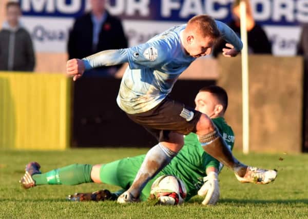 David Cushley rounds Carrick goalkeeper Brian Neeson to score Ballymena United's second goal in Saturday's Danske Bank Premiership match at the Belfast Loughshore Hotel Arena - but the Sky Blues conceded two late goal as the game finished 2-2. Picture: Press Eye.