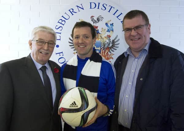 Lisburn Distillery chairman Jim Greer (left) with the club's new manager Sean-Paul Murray (centre) and new assistant manager Eamonn McCarthy. Picture - David Hunter.