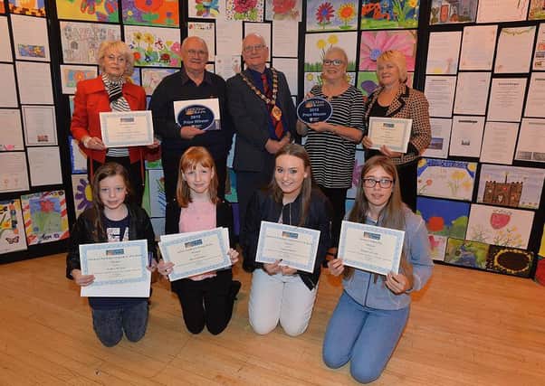 Carrickfergus in Bloom community award winners pictured with  Billy Ashe, Mayor of Mid and East Antrim.  Picture By: Arthur Allison/Pacemaker Press  INCT 45-729-CON