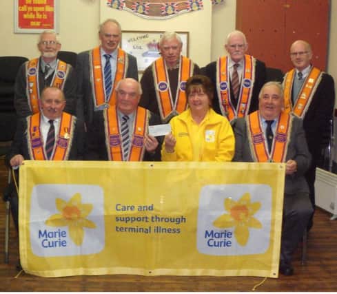 Back (L-R) Brother John Kerr, Brother John Calderwood, Brother Jim Wylie, BBrother David Logan, Brother Harry Moody
Front (L-R) Brother Robert Getty, Brother William McCallion WDM, Alison Hanna (Marie Currie representative), Brother Bobby Andrews DDM.