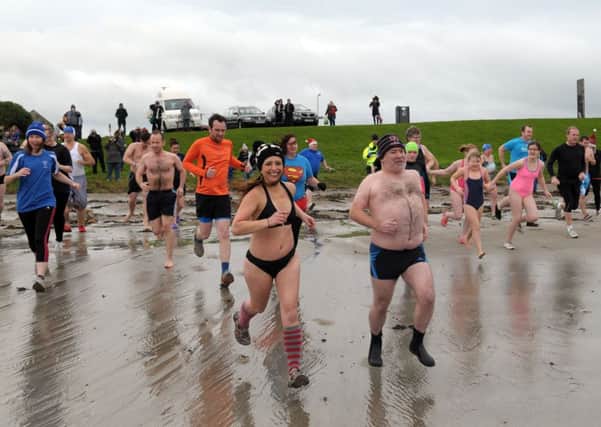 Taking part in the 2015 New Year's Day dip at Brown's Bay.  INLT 02-205-AM