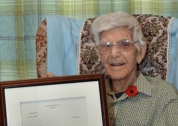 Charles Oakes pictured with his Legion D'honneur award. INLM46-212.