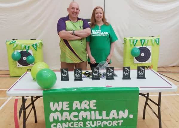 George Heath with Lisa McGrogan of Macmillan Cancer Support group.
