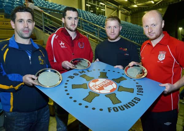 Pictured receiving their Firmus Energy BSML player of the Month awards for October from Donald Crawford are, Ryan Carson (Newpark Olympic), Sean Ward (Carnlough Swifts) and Paul McCann (Ruby's Rovers). INBT 46-809H