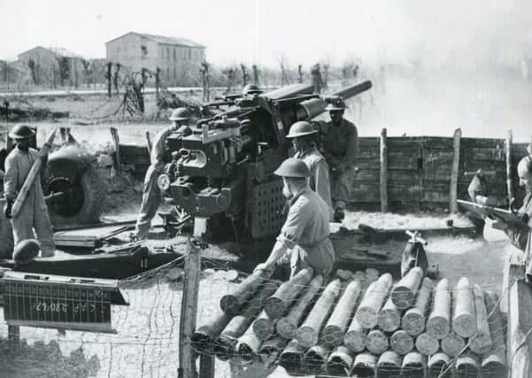 A 3.7-inch HAA gun firing in support of Fifth (US) Army south of the Arno river in August 1944.