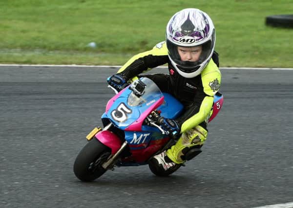 No-one can deny the commitment of some of the youngsters at minibike racing. Picture: Roy Adams.