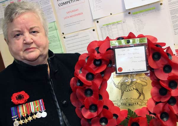 Anne Church, who layed a wreath on behalf of her father George Shingleton at Broughshane Remembrance service on Sunday morning  INBT 46-901H