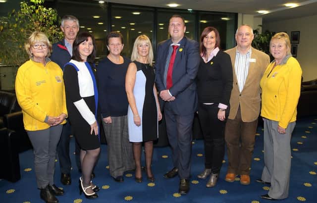 Former Mayor Andrew Ewing pictured with volunteers from the Lisburn branch of Marie Curie during a reception when he handed over a cheque for more than £56,000 to the charity, raised during his nine months in office. US1544-537cd  Picture: Cliff Donaldson