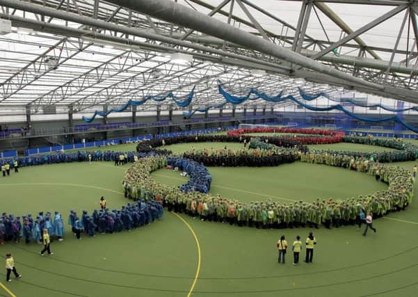 Pupils from Magherafelt form the Olympic Rings at Meadowbank Sports Arena to win a world record. Hamburg has now beaten them to claim the title with over 6,000 people