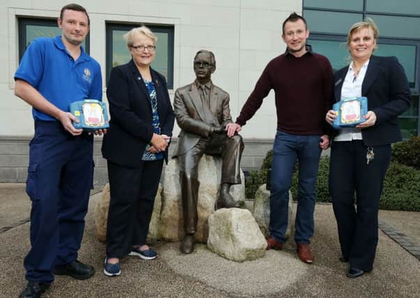 Councillor Margaret Tolerton pictured with Debfrillator Trainer, Kevin Madden and Lagan Valley Island First Aiders, George Stanfield and Diane Smyth.