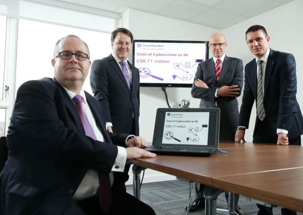 Undated handout photo of Mike Harris, Partner, Cyber Security, Grant Thornton; Paul Jacobs, Partner, Head of Forensics and Investigation Services Ireland and Global Cyber Security leader; Richard Gillan, Managing Partner of Grant Thornton Northern Ireland and  Detective Chief Inspector Douglas Grant, of the PSNI Special Investigations and Cyber Crime Centre at the official launch of Grant ThorntonÕs International Business Report (IBR) in the firmÕs Belfast offices where new research reveals that cyber crime is costing the Northern Ireland economy almost £100 million per year.  
 PRESS ASSOCIATION Photo. Issue date: Monday November 9, 2015.