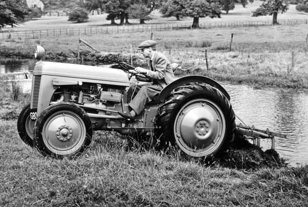 Harry Ferguson driving a TE-20 at his Cotswold home, Abbotswood.