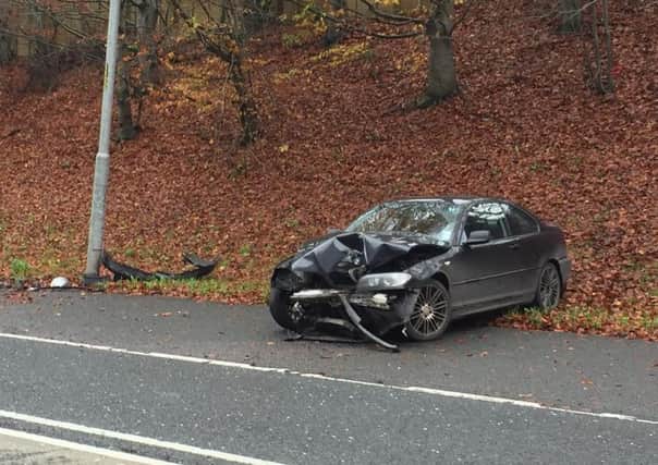 BMW wreckage lying by the roadside at 9.30am on Wednesday