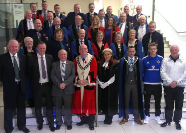 Northern Ireland manager Michael O'Neill and captain Steven Davis pictured with Mid and East Antrim councillors at a special function in the Braid complex.