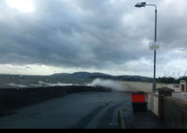 Stormy seas at Rhanbuoy in Carrick were filmed by Terry Norton.  INCT 47-726-CON