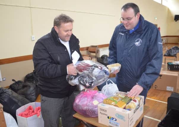 Rev Mark Greenstreet and  Rev Mark Lennox with some of the donations.