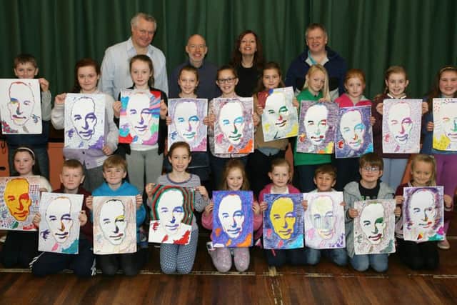 Ross Wilson, artist, pictured with children and leaders during the CS Lewis Project at Coleraine Methodist Church Hall on Saturday. INCR48-318PL